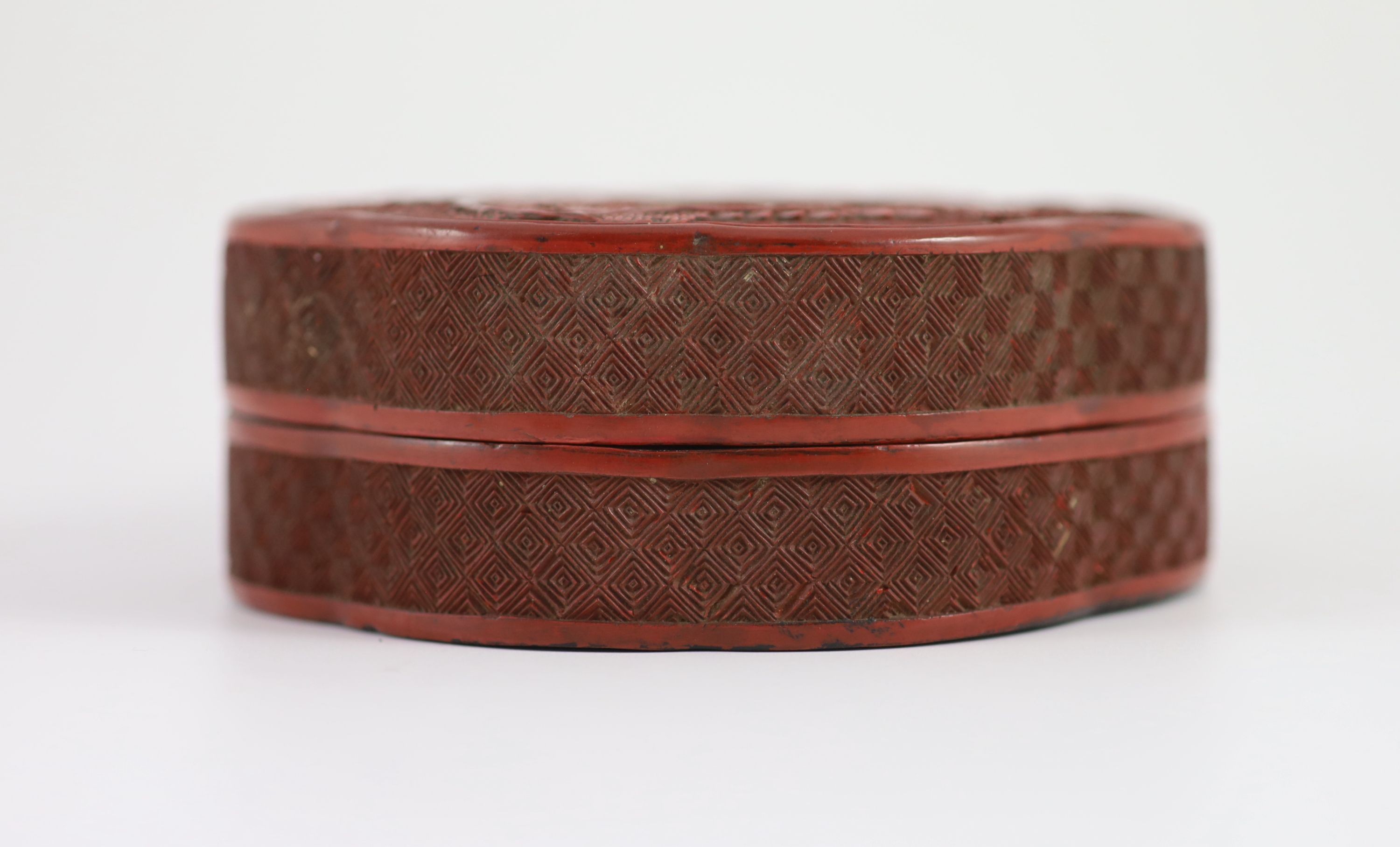 A Chinese cinnabar lacquer ‘boys’ box and cover, 19th century 13.5 cm diameter